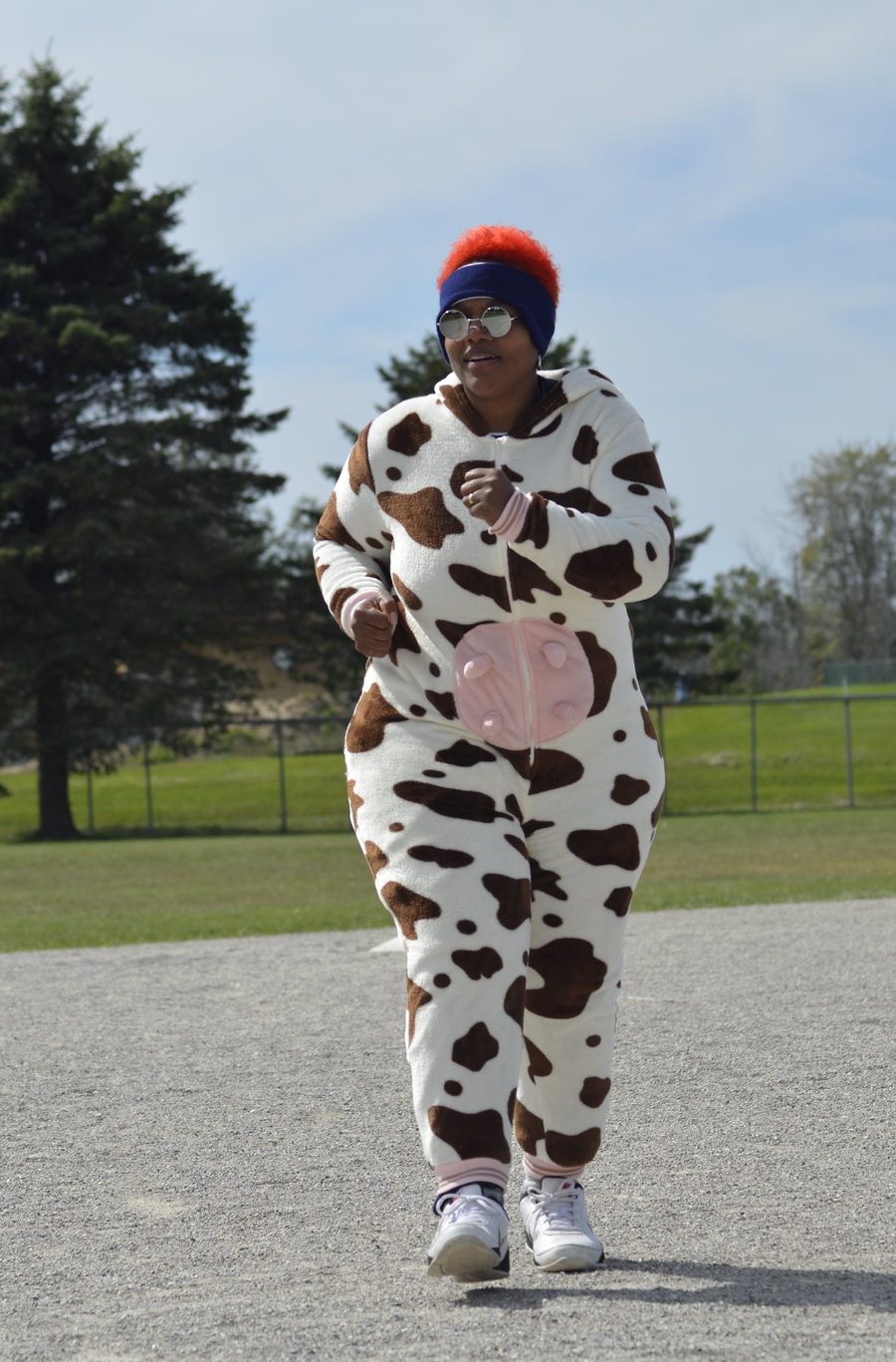 A player in a cow costume