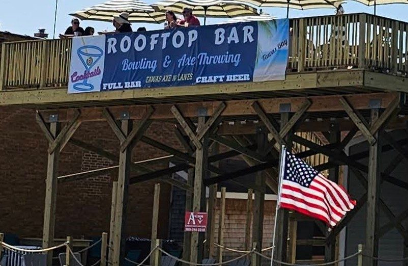 Rooftop bar with craft beer and axe throwing