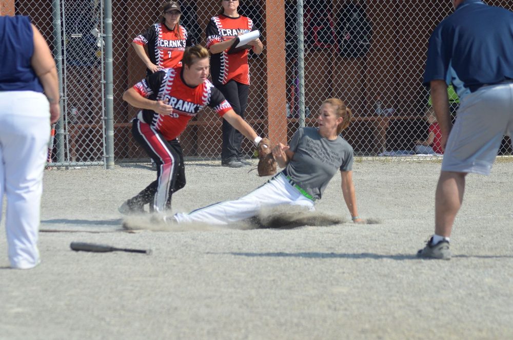 A player sliding into home plate